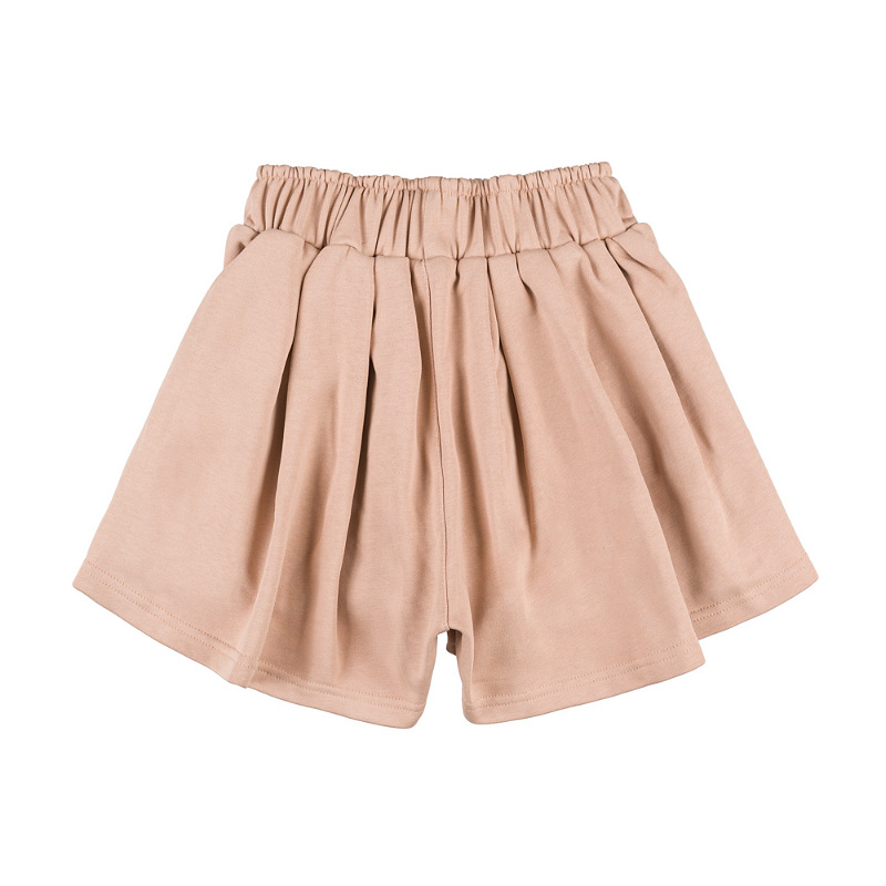 Wide beige shorts with patches